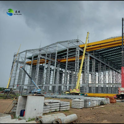 SAW MIG GMAW वेल्डिंग विधि के साथ स्टील स्ट्रक्चर वेयरहाउस, धातु शीट की दीवार और अनुकूलन योग्य ड्राइंग योजना